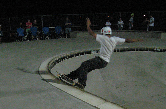 Andrew Black frontside feeble grinds in the shallow end